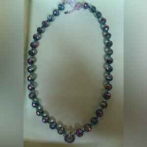 Necklace with horseshoe pendant